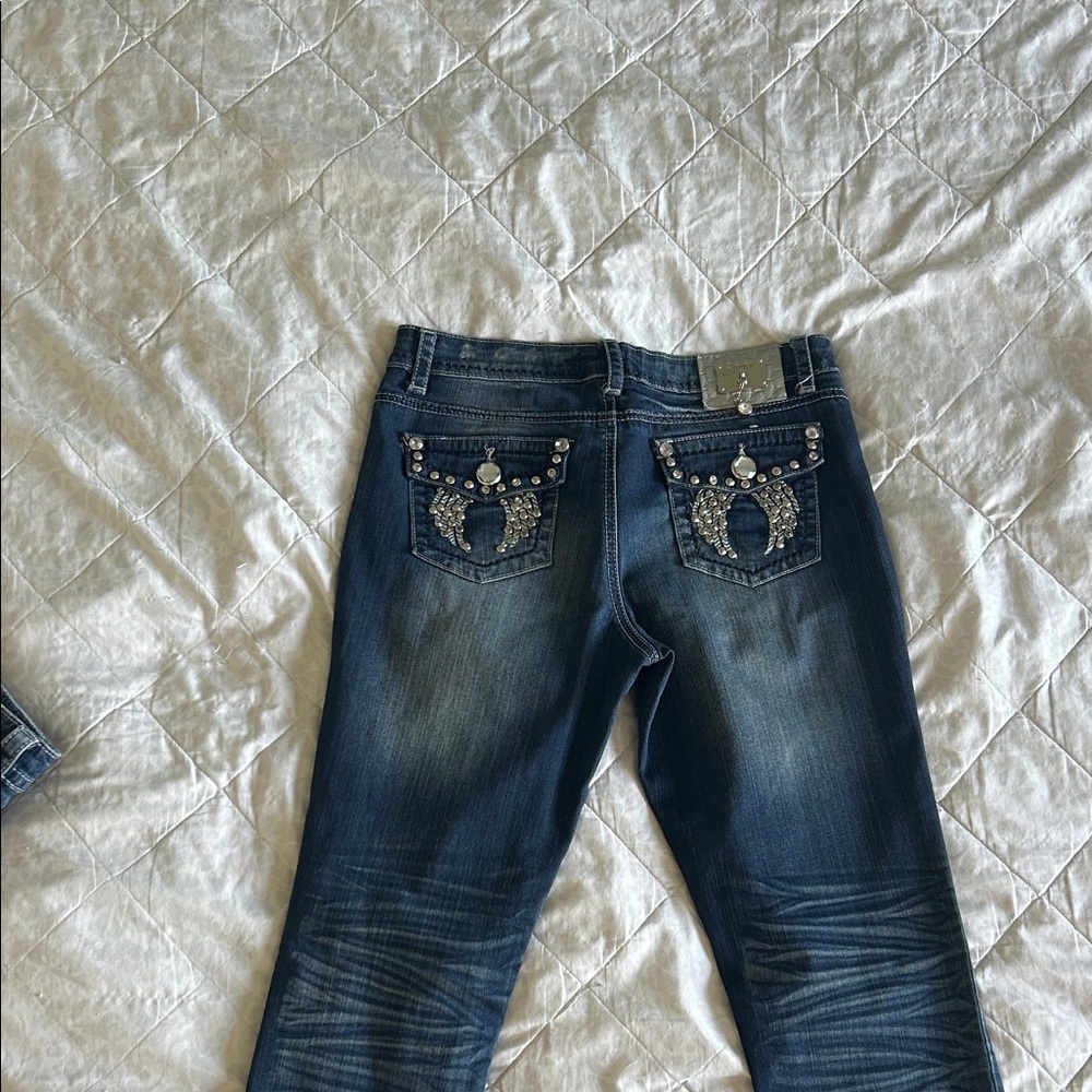 Elegant Blue Skinny Jeans with Embellished Pockets
